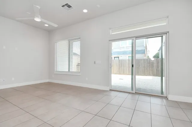 a view of an empty room and window