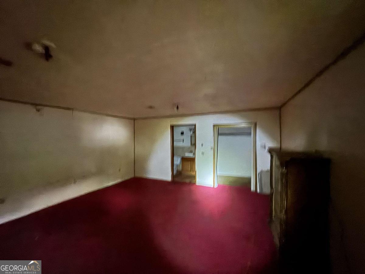 512 Dupont Street Augusta, GA 30901 - Photo 7 of 8 a view of empty room with wooden floor