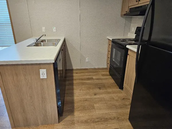 a bathroom with a sink a toilet and vanity