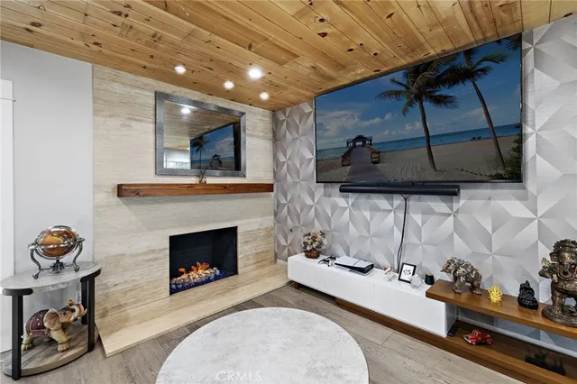 a living room with a fireplace furniture and a fireplace