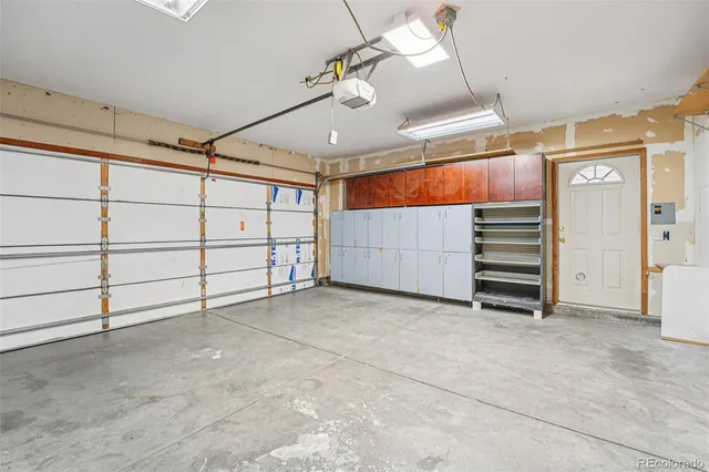 a view of a livingroom with an empty space and a window
