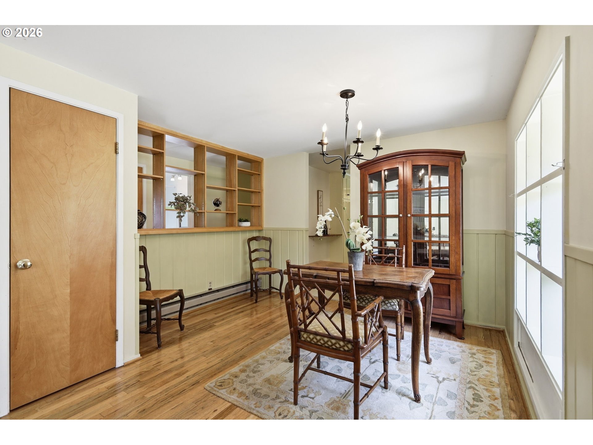 3025 Harris Street Eugene, OR 97405 - Photo 11 of 44 a view of a dining room with furniture and a chandelier