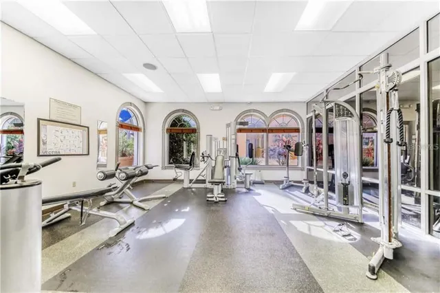 a view of a large building with a couple of flower plants