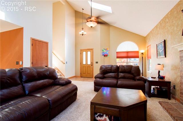 7808 Swiftrun Road Colorado Springs, CO 80920 - Photo 6 of 33 View to Living Room and Entry