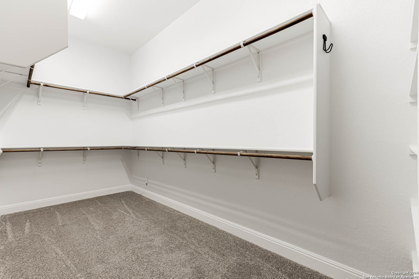 17419 Hillsedge Road San Antonio, TX 78257 - Photo 28 of 57 a view of an empty walk in closet