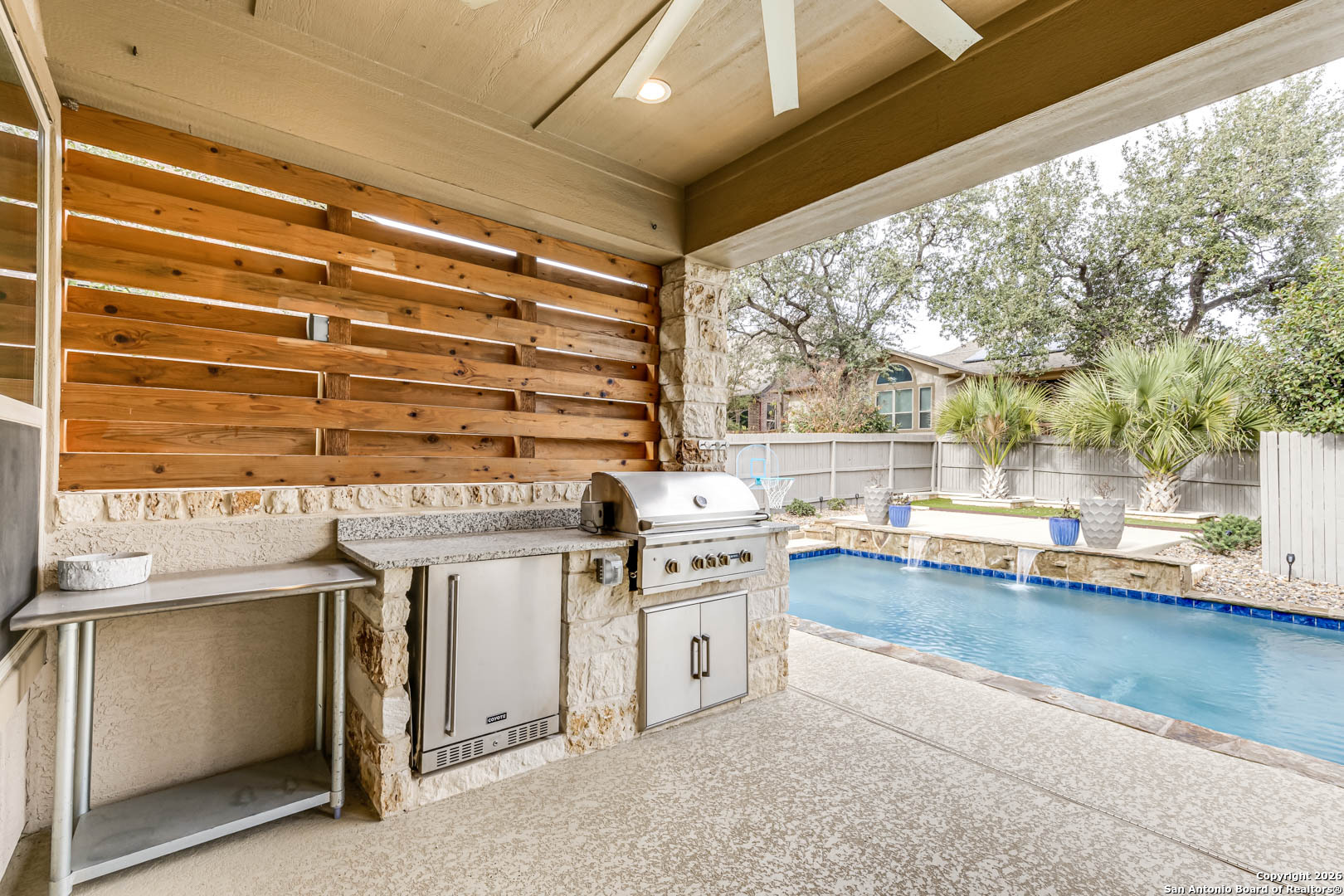17419 Hillsedge Road San Antonio, TX 78257 - Photo 50 of 57 a view of a kitchen with a stove and a large window