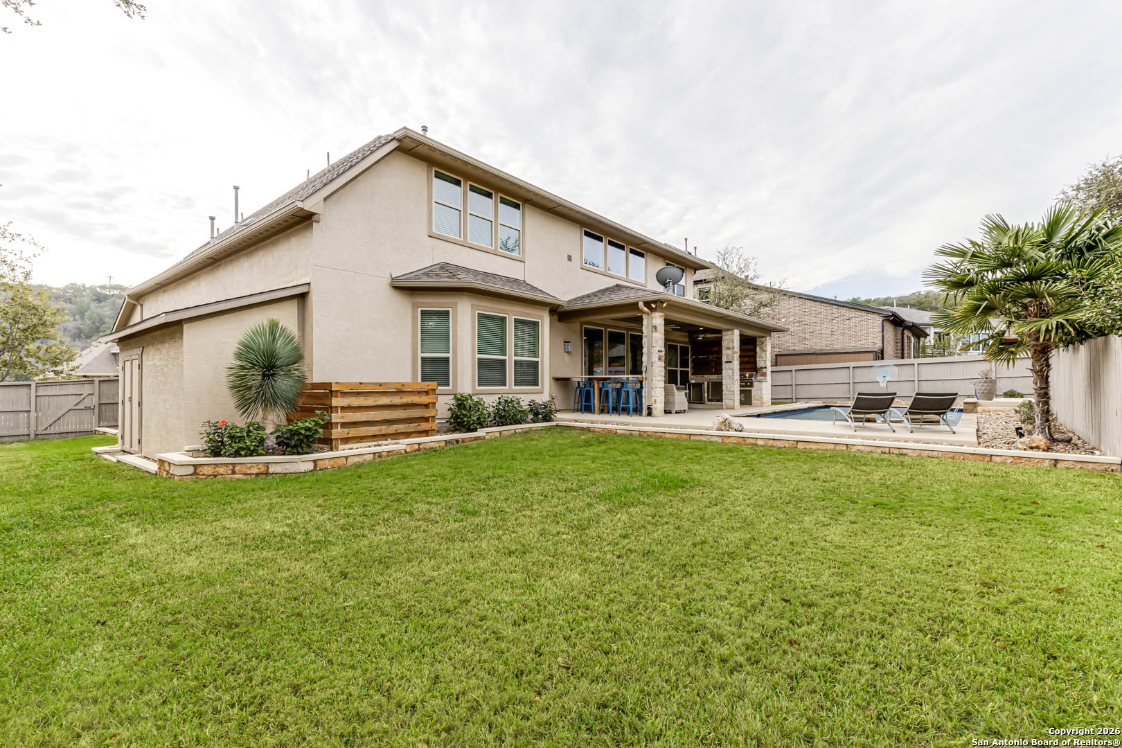 17419 Hillsedge Road San Antonio, TX 78257 - Photo 54 of 57 a view of a house with a backyard patio and swimming pool