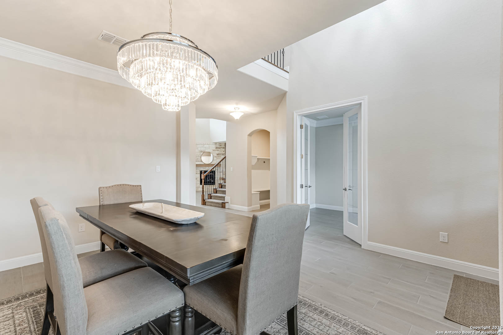 17419 Hillsedge Road San Antonio, TX 78257 - Photo 6 of 57 a view of a dining room with furniture and chandelier