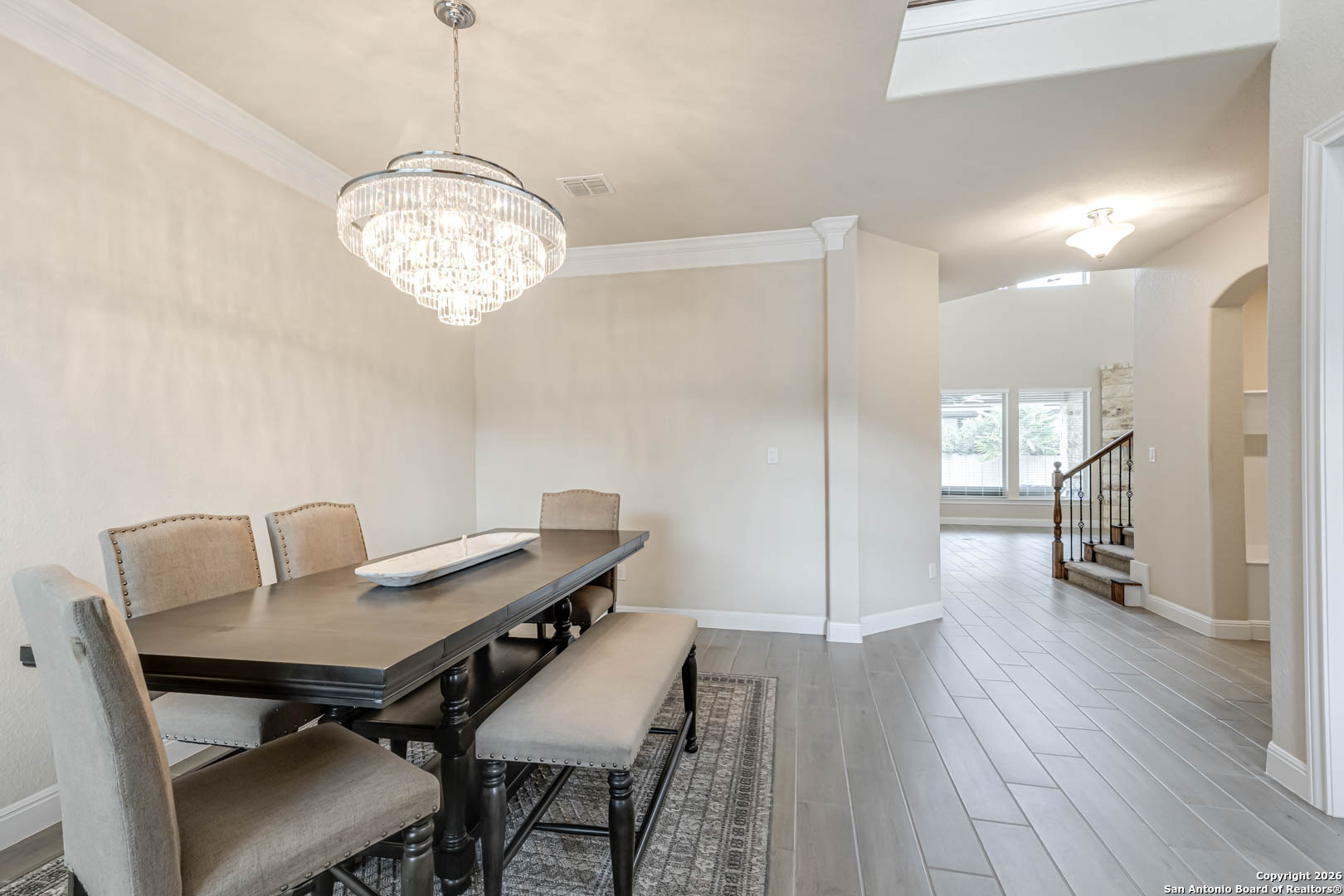 17419 Hillsedge Road San Antonio, TX 78257 - Photo 7 of 57 a view of a dining room with furniture and wooden floor