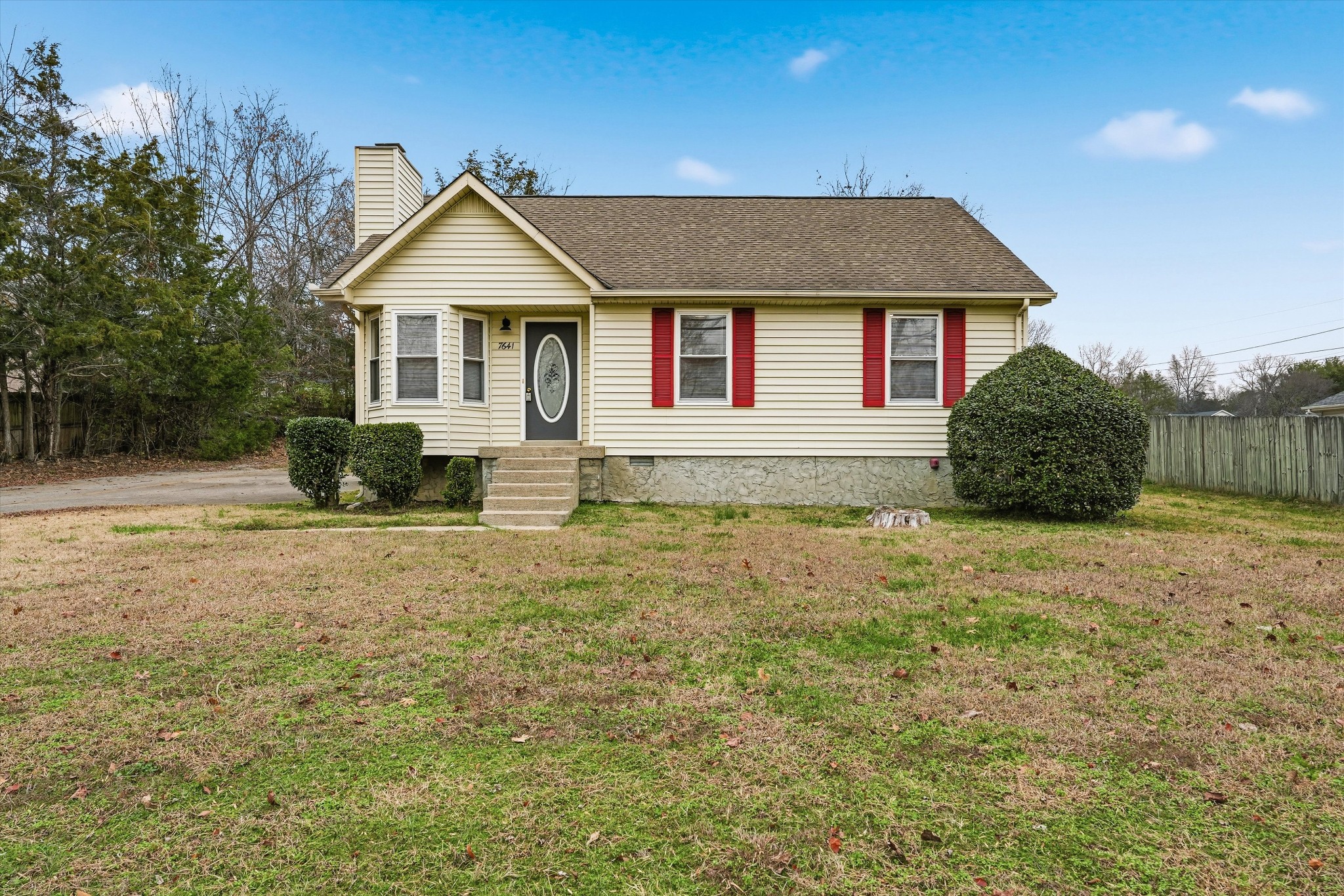 7641 Saundersville Road Mount Juliet, TN 37122 - Photo 1 of 29 a front view of a house with garden