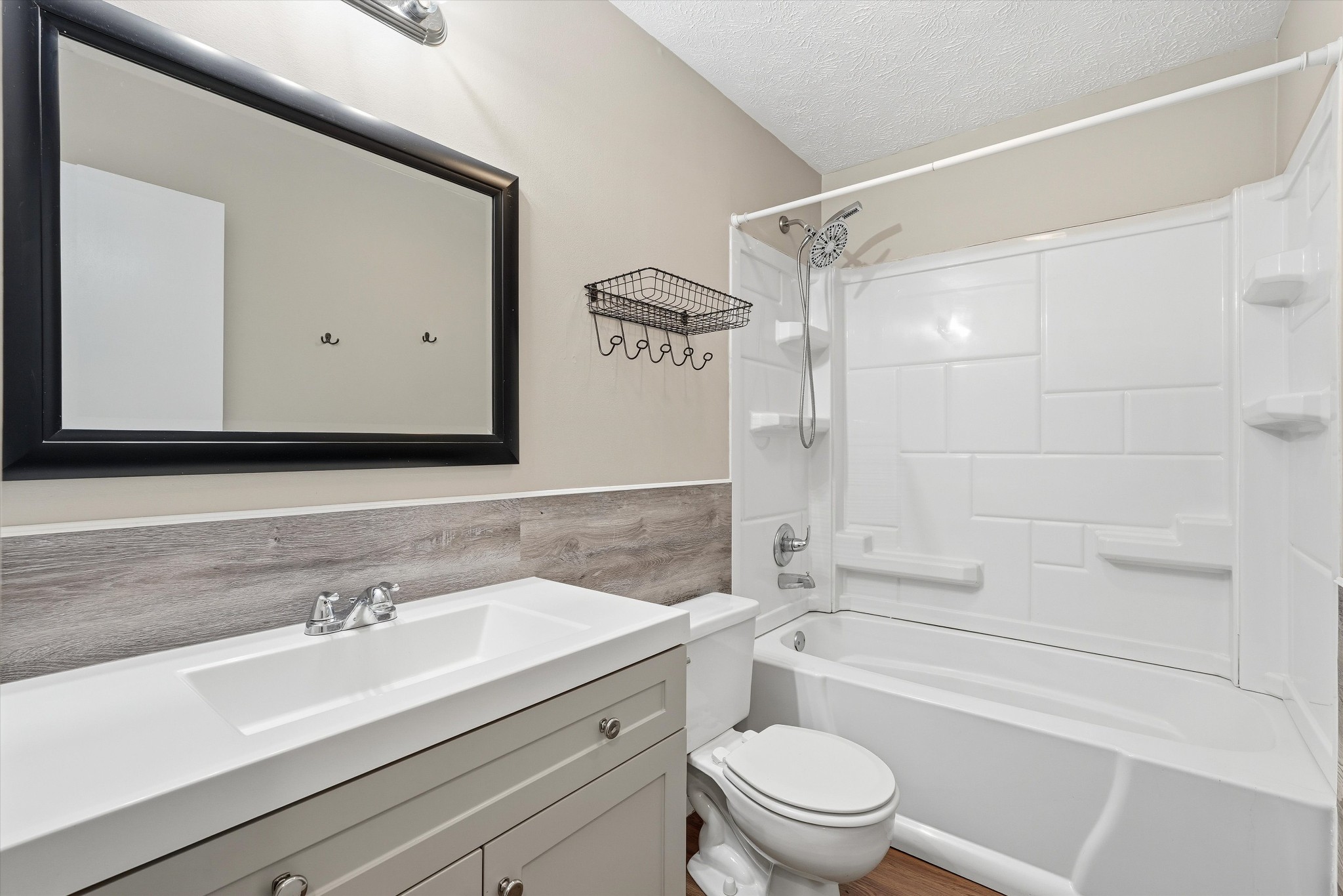 7641 Saundersville Road Mount Juliet, TN 37122 - Photo 17 of 29 a bathroom with a sink a toilet and a bathtub