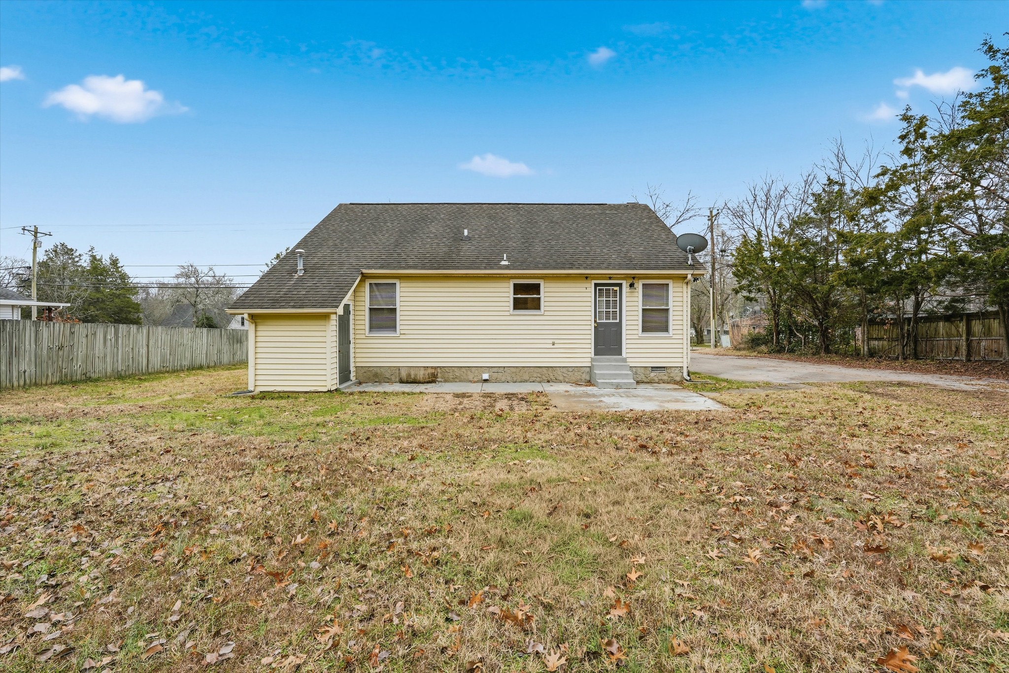 7641 Saundersville Road Mount Juliet, TN 37122 - Photo 26 of 29 a view of a house with a backyard