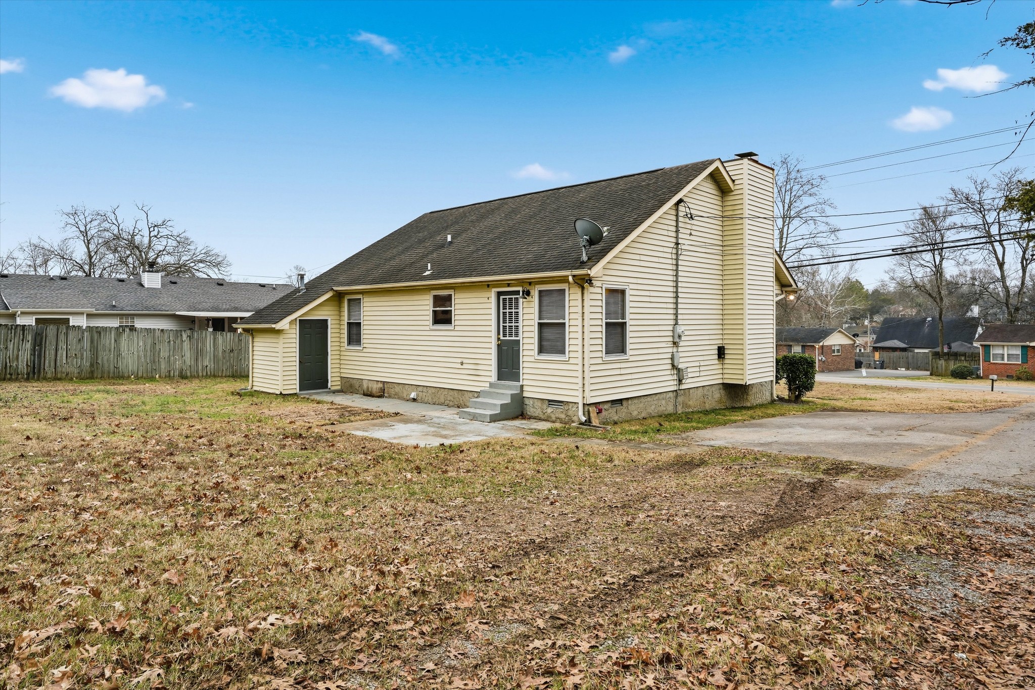 7641 Saundersville Road Mount Juliet, TN 37122 - Photo 28 of 29 a view of a house with a backyard