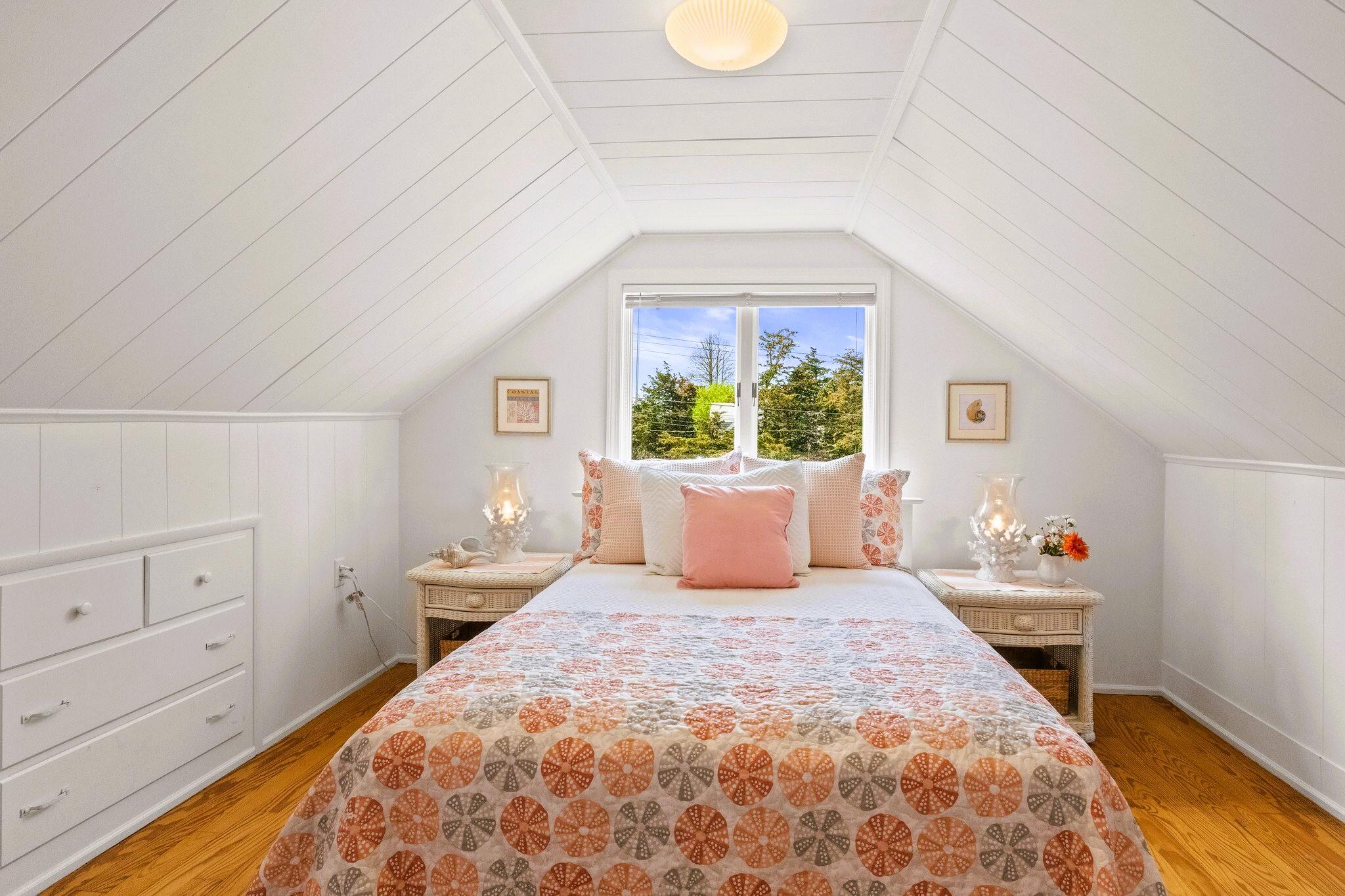 9 Doane Road Orleans, MA 02653 - Photo 23 of 31 a bedroom with a bed and a dresser