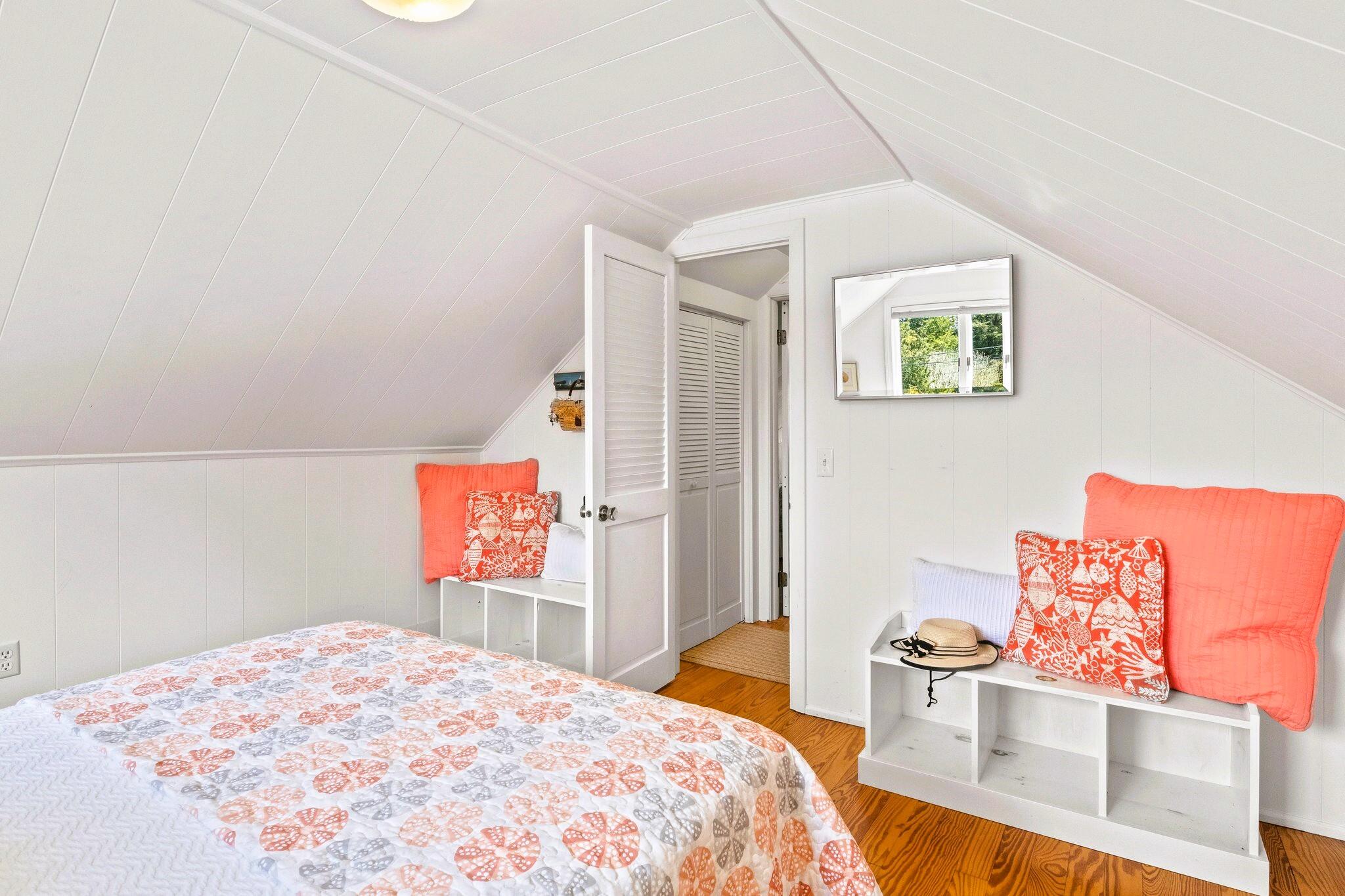 9 Doane Road Orleans, MA 02653 - Photo 24 of 31 a bedroom with a bed and dresser
