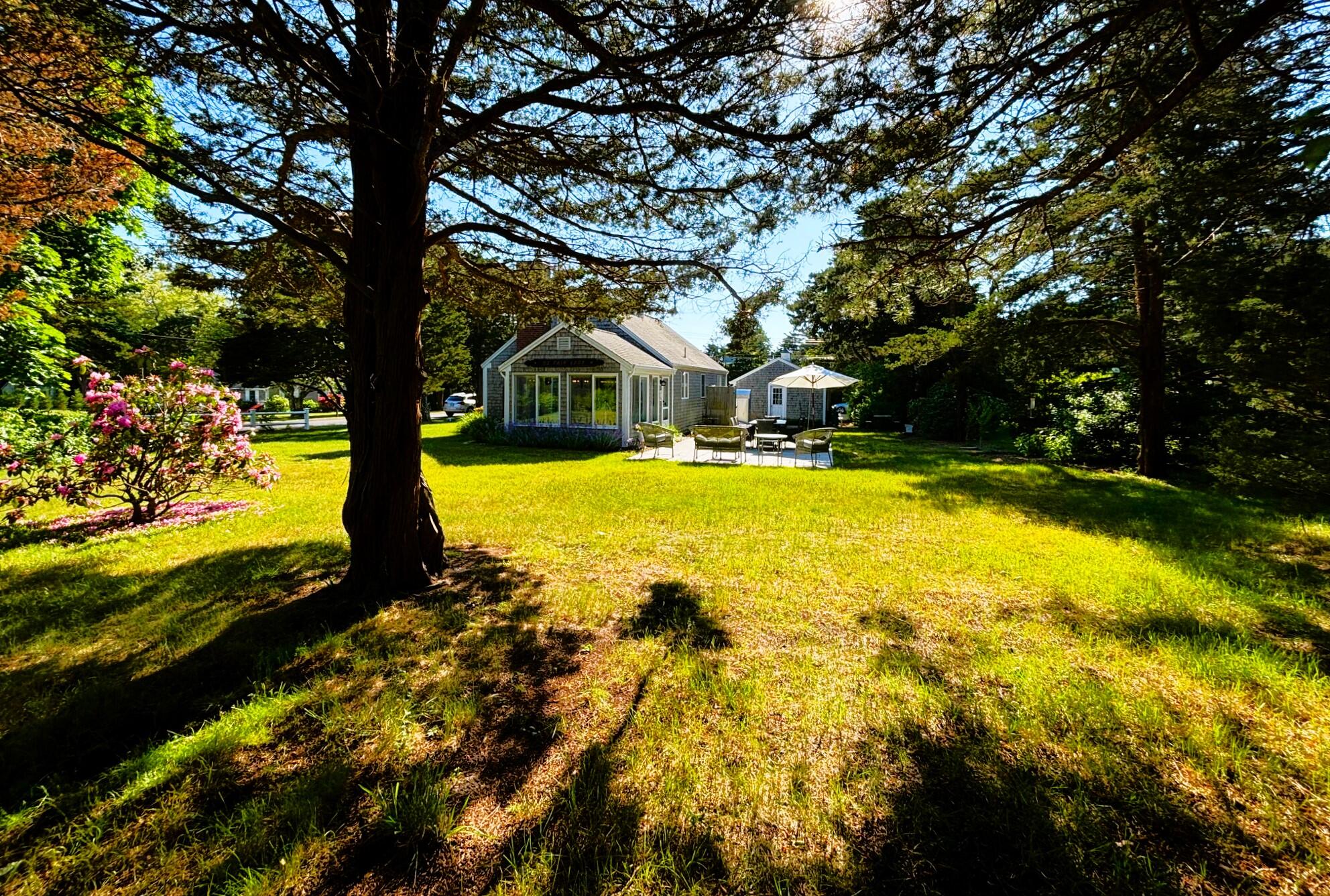 9 Doane Road Orleans, MA 02653 - Photo 31 of 31 a view of a house with a yard