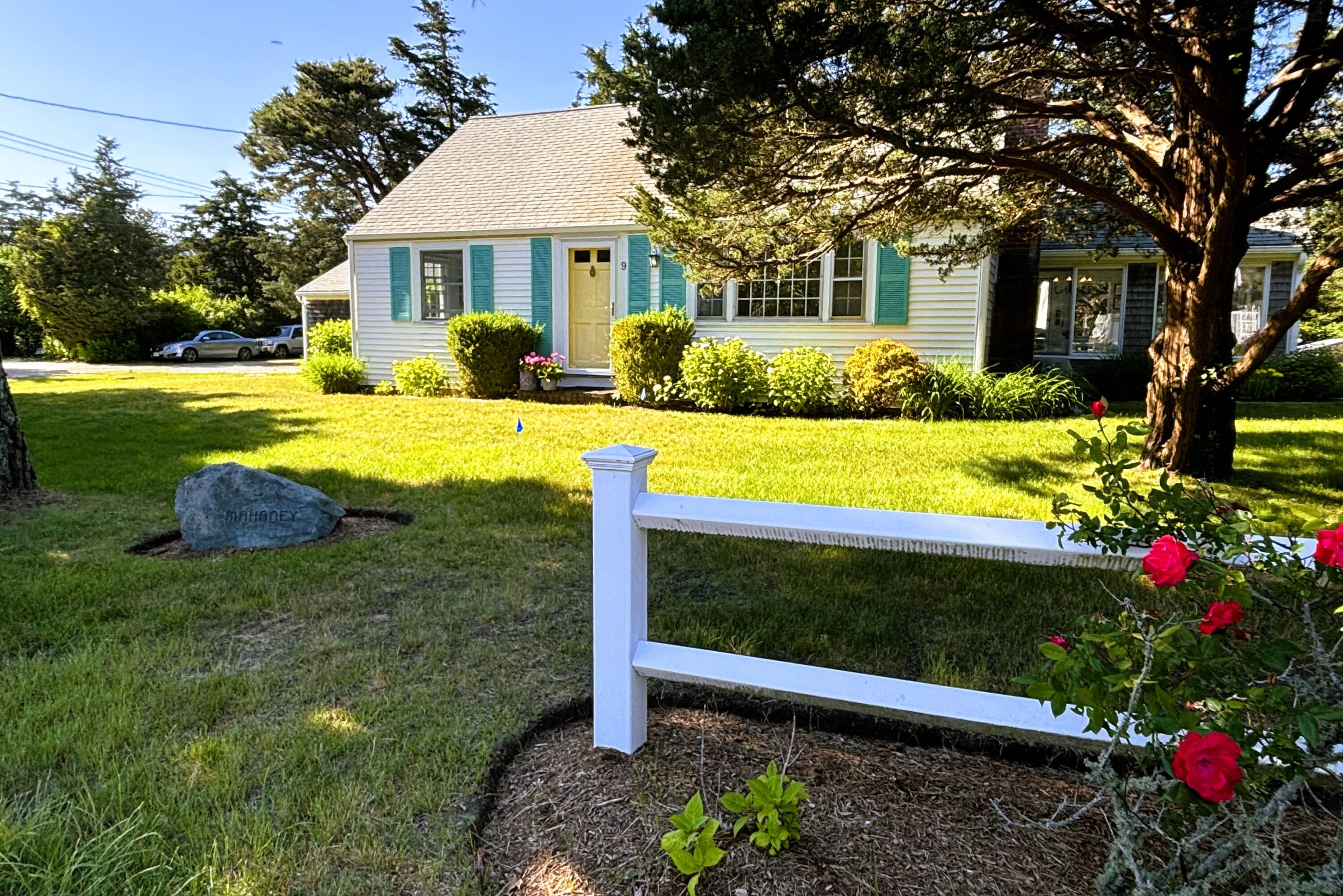 9 Doane Road Orleans, MA 02653 - Photo 6 of 31 a front view of a house with porch