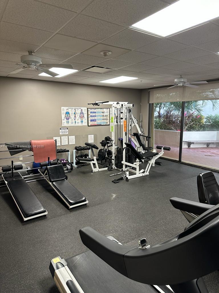 1621 Collins Avenue, Unit 505 Miami Beach, FL 33139 - Photo 14 of 25 a room with gym equipment and a large window