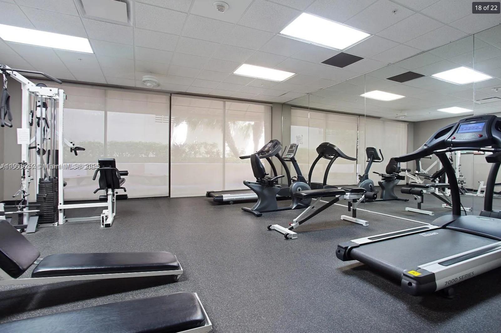 1621 Collins Avenue, Unit 505 Miami Beach, FL 33139 - Photo 15 of 25 a view of a room with gym equipment