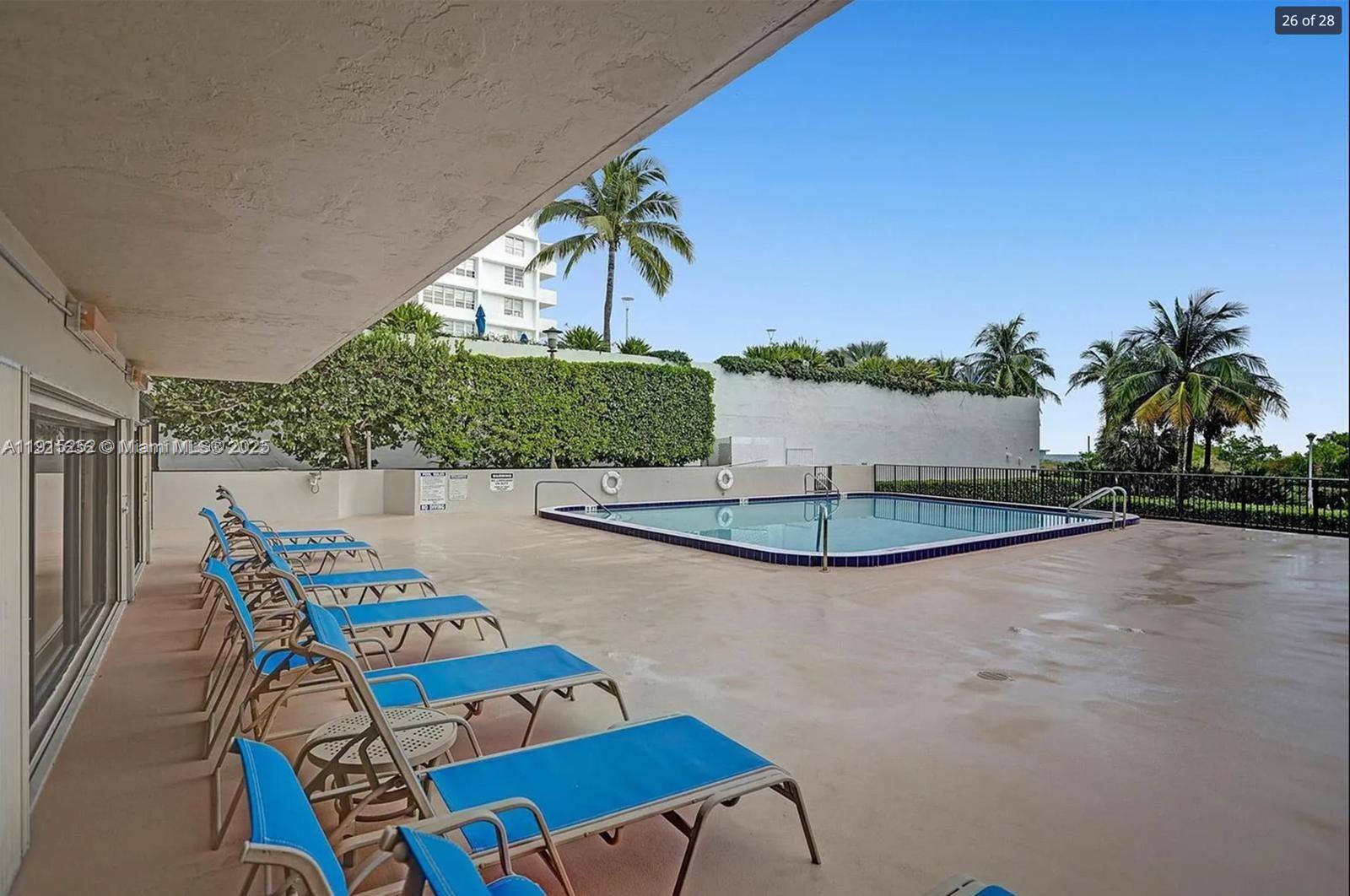 1621 Collins Avenue, Unit 505 Miami Beach, FL 33139 - Photo 5 of 25 a view of a chairs and table in the patio