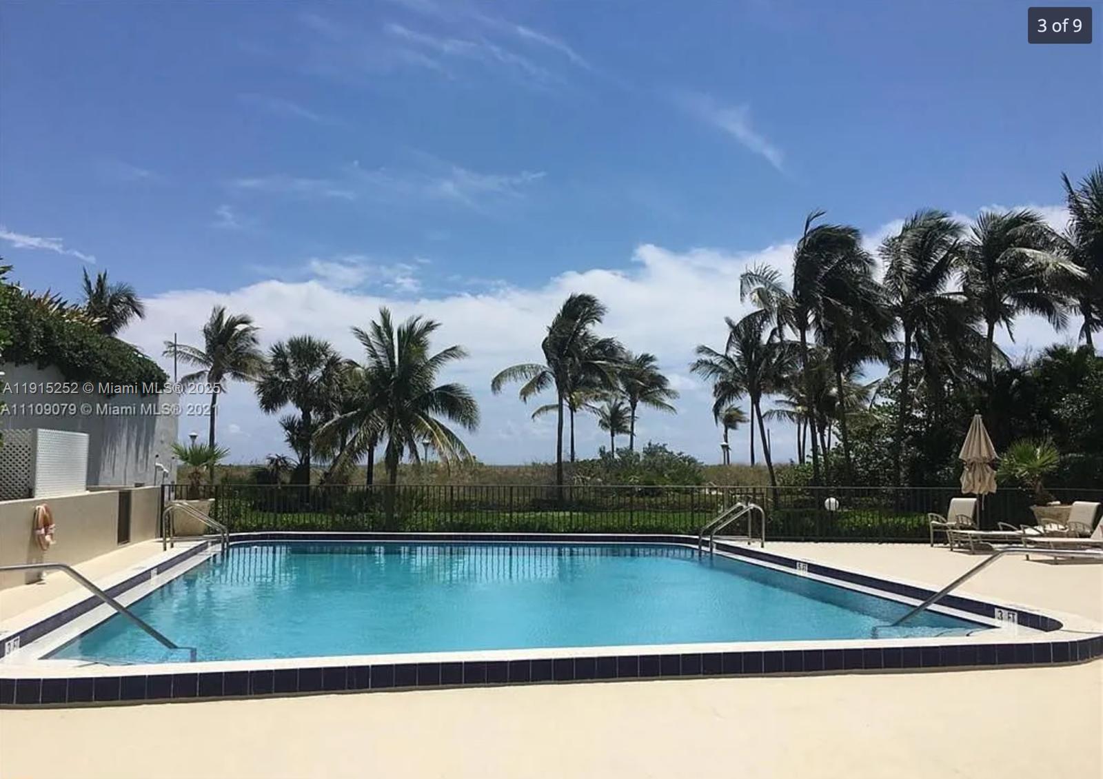 1621 Collins Avenue, Unit 505 Miami Beach, FL 33139 - Photo 6 of 25 a view of swimming pool with outdoor seating and trees
