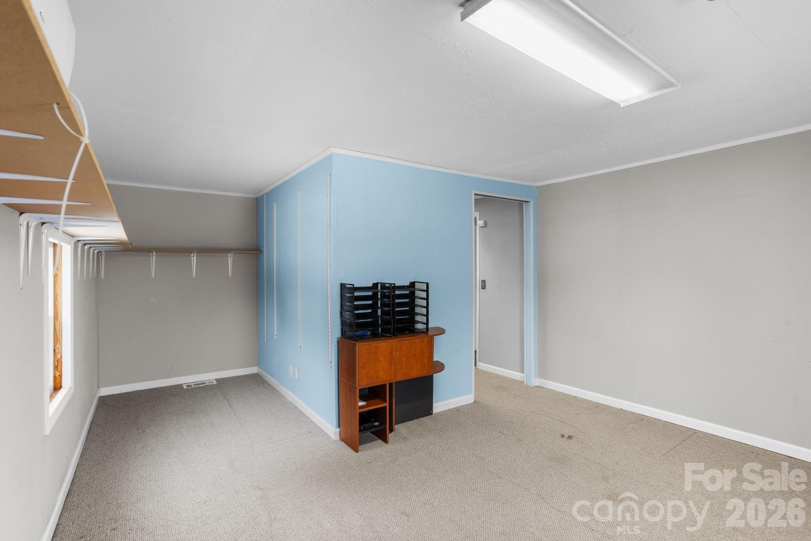 4855 Talley Road Walkertown, NC 27051 - Photo 28 of 45 an empty room with windows