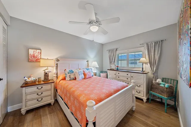 a bed room with a bed and a window