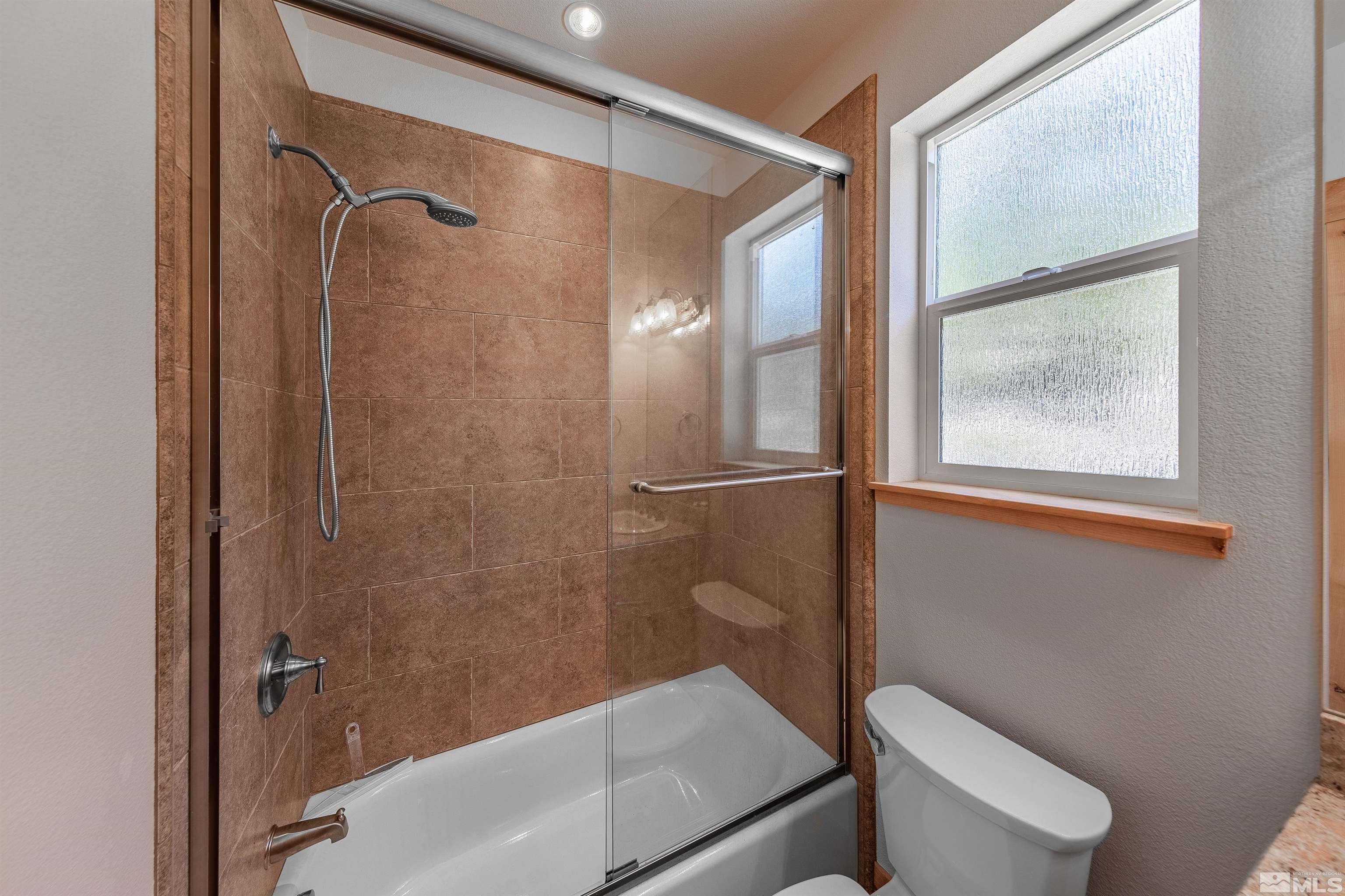 278 Andria Drive Stateline, NV 89449 - Photo 11 of 37 a bathroom with a shower and a toilet