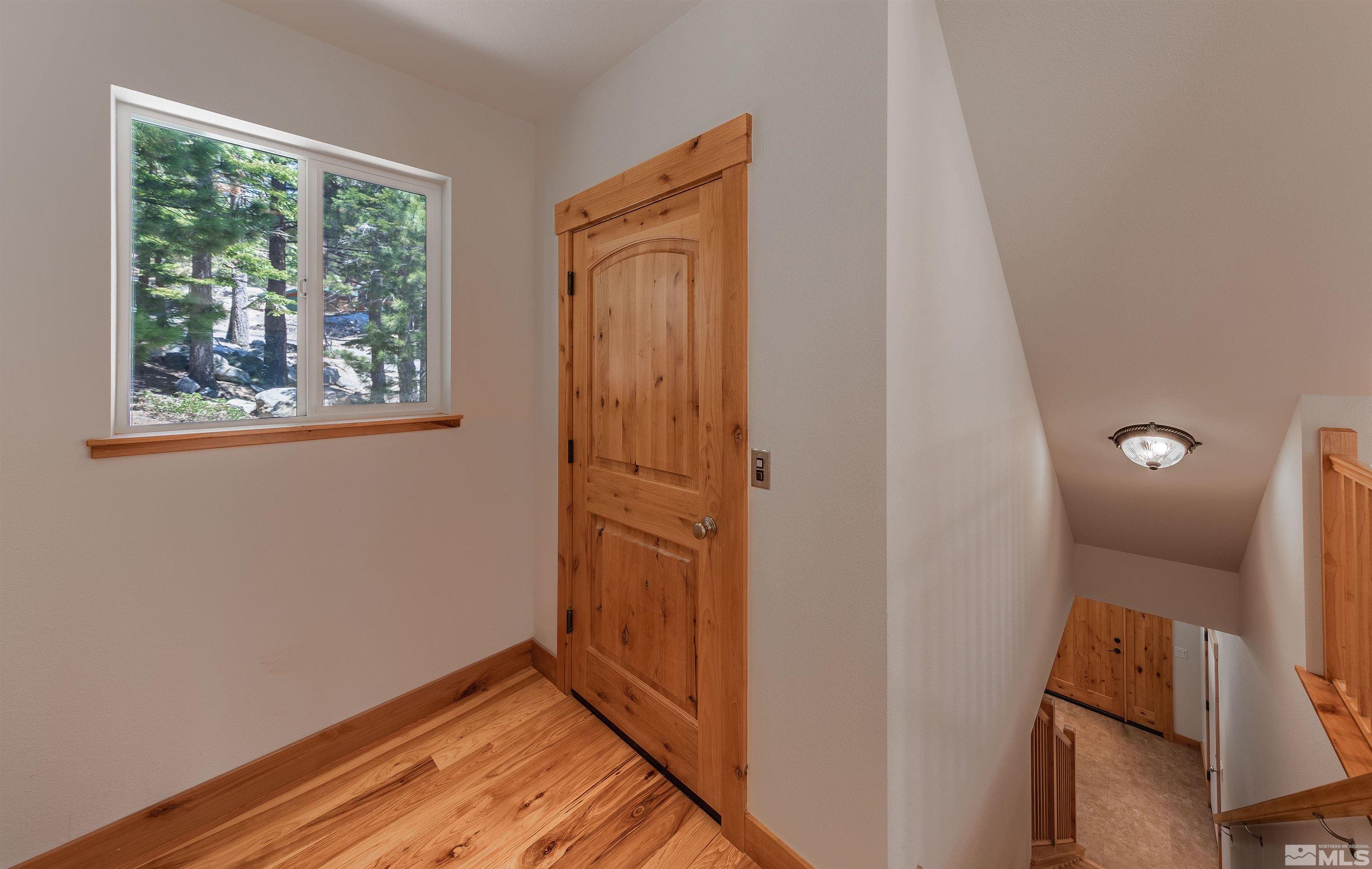 278 Andria Drive Stateline, NV 89449 - Photo 14 of 37 a view of an entryway with wooden floor