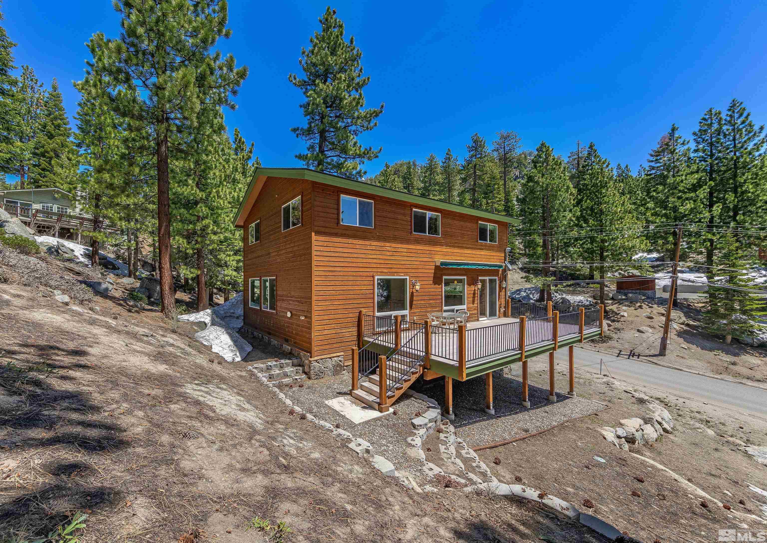 278 Andria Drive Stateline, NV 89449 - Photo 25 of 37 a view of a chairs and table in the back yard of the house
