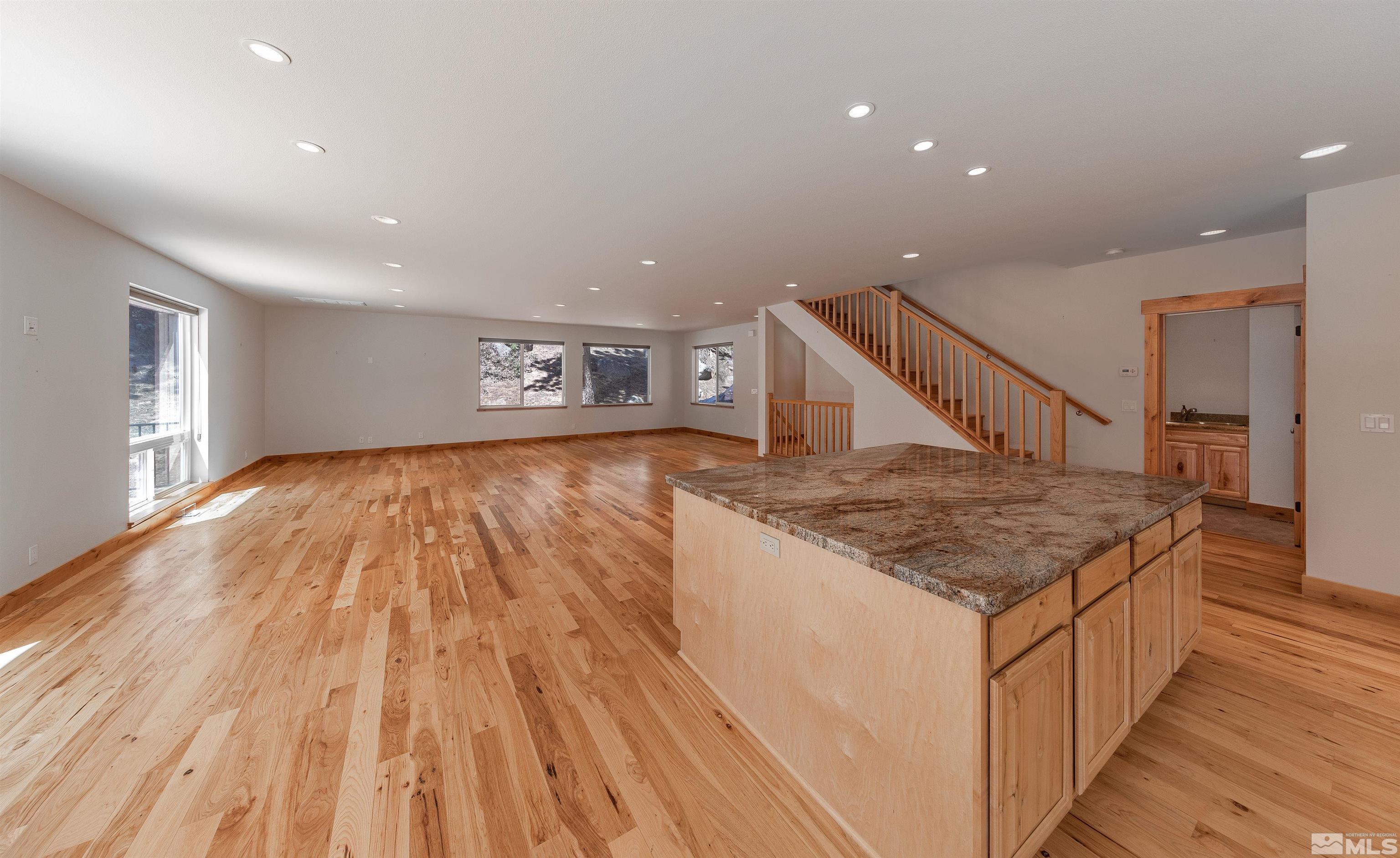 278 Andria Drive Stateline, NV 89449 - Photo 5 of 37 a kitchen with a sink and wooden floor