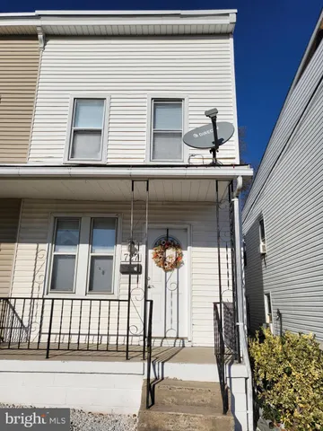 a view of a house with a porch
