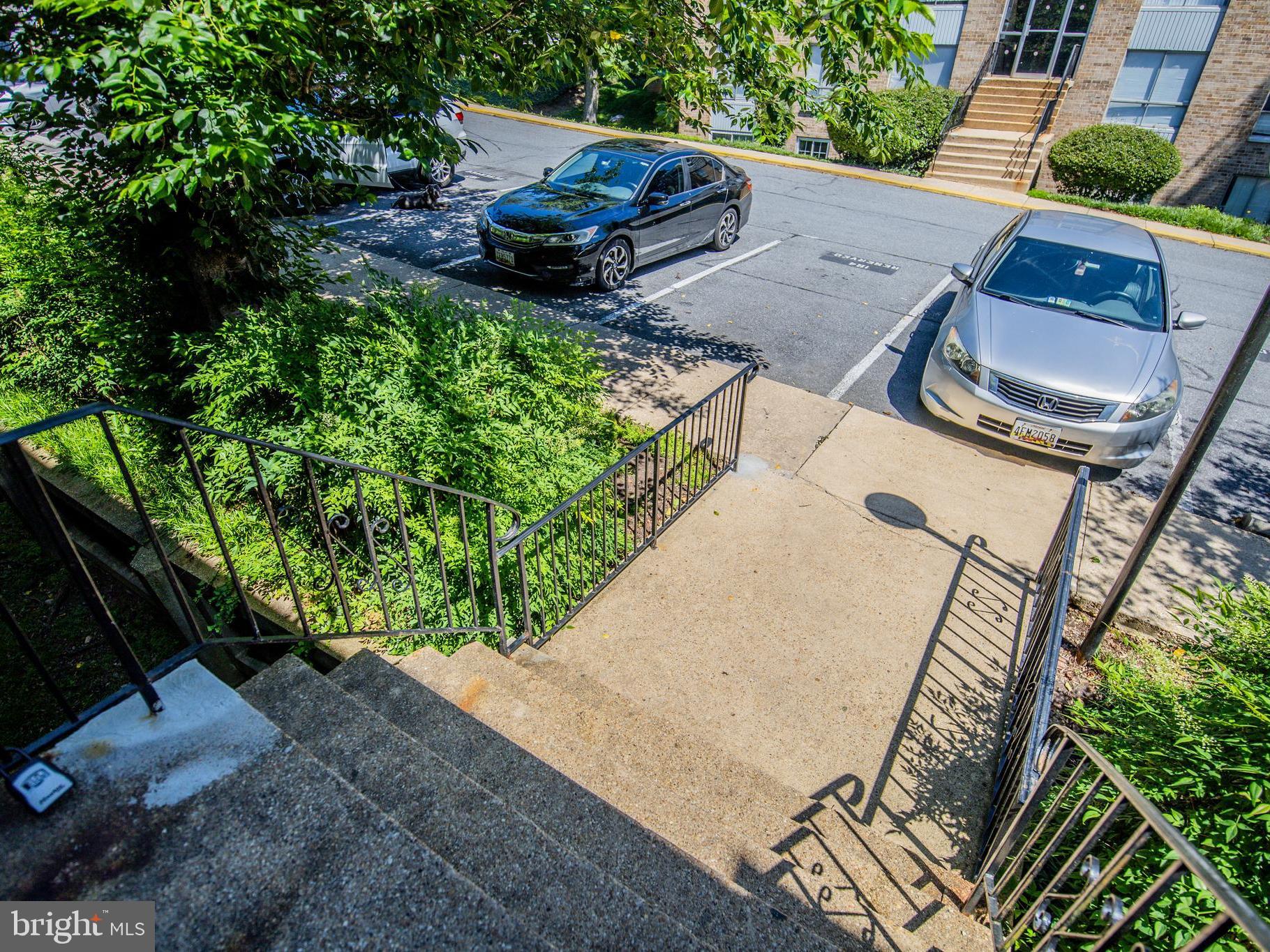 3934 Bel Pre Road, Unit 39342 Silver Spring, MD 20906 - Photo 29 of 30 a view of an outdoor sitting area with fire pit