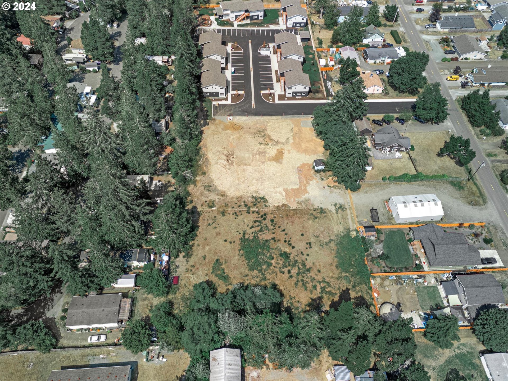 35340 Bayside Gardens Road Nehalem, OR 97131 - Photo 12 of 23 an aerial view of residential houses with outdoor space