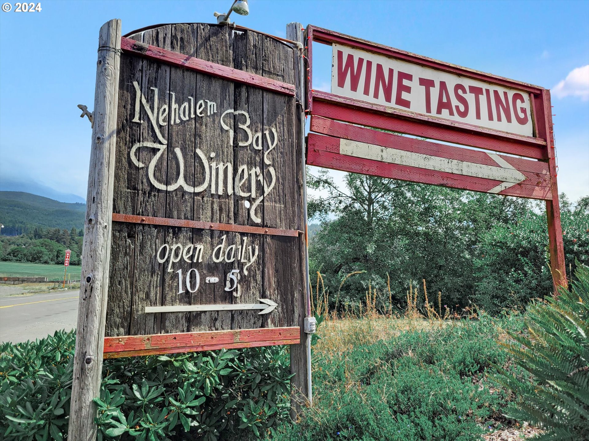 35340 Bayside Gardens Road Nehalem, OR 97131 - Photo 14 of 23 a sign on the side of a building