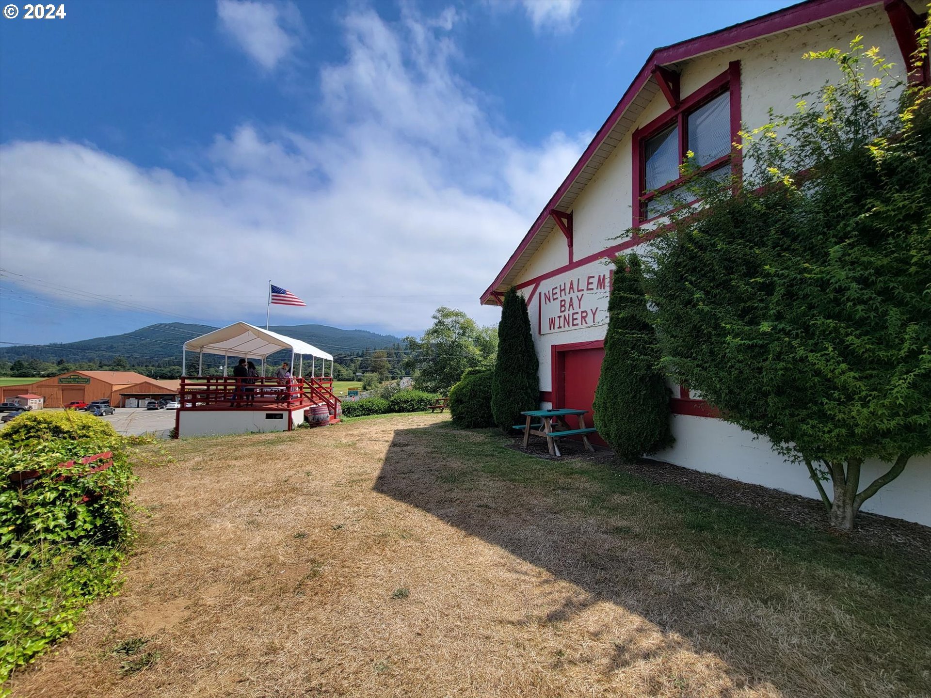 35340 Bayside Gardens Road Nehalem, OR 97131 - Photo 15 of 23 a view of a house with backyard and sitting area