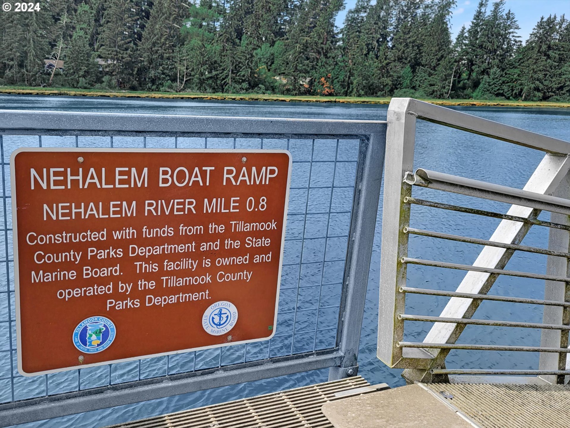 35340 Bayside Gardens Road Nehalem, OR 97131 - Photo 17 of 23 a view of a door with wooden floor and a window