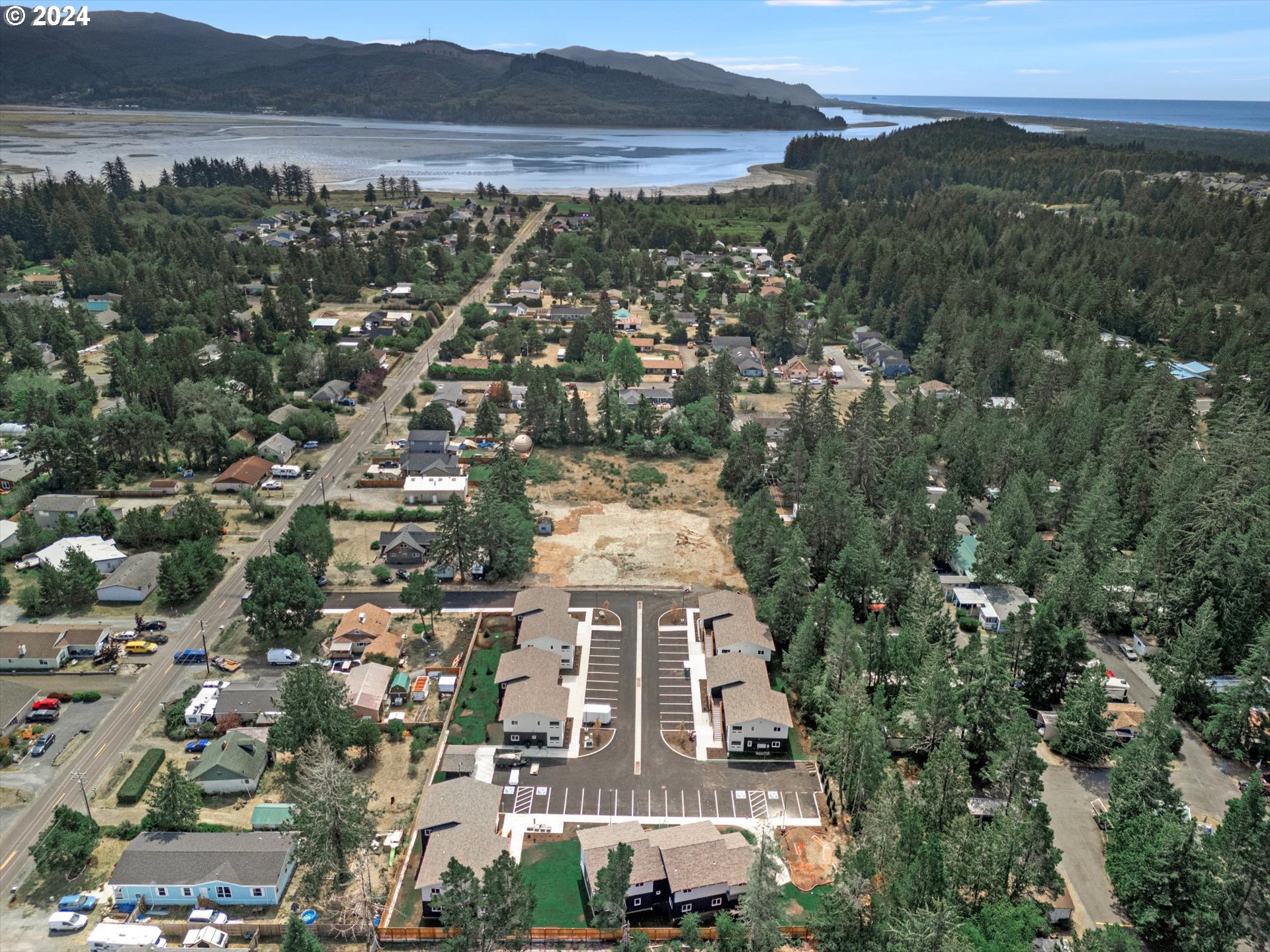 35340 Bayside Gardens Road Nehalem, OR 97131 - Photo 2 of 23 an aerial view of residential building with outdoor space and trees