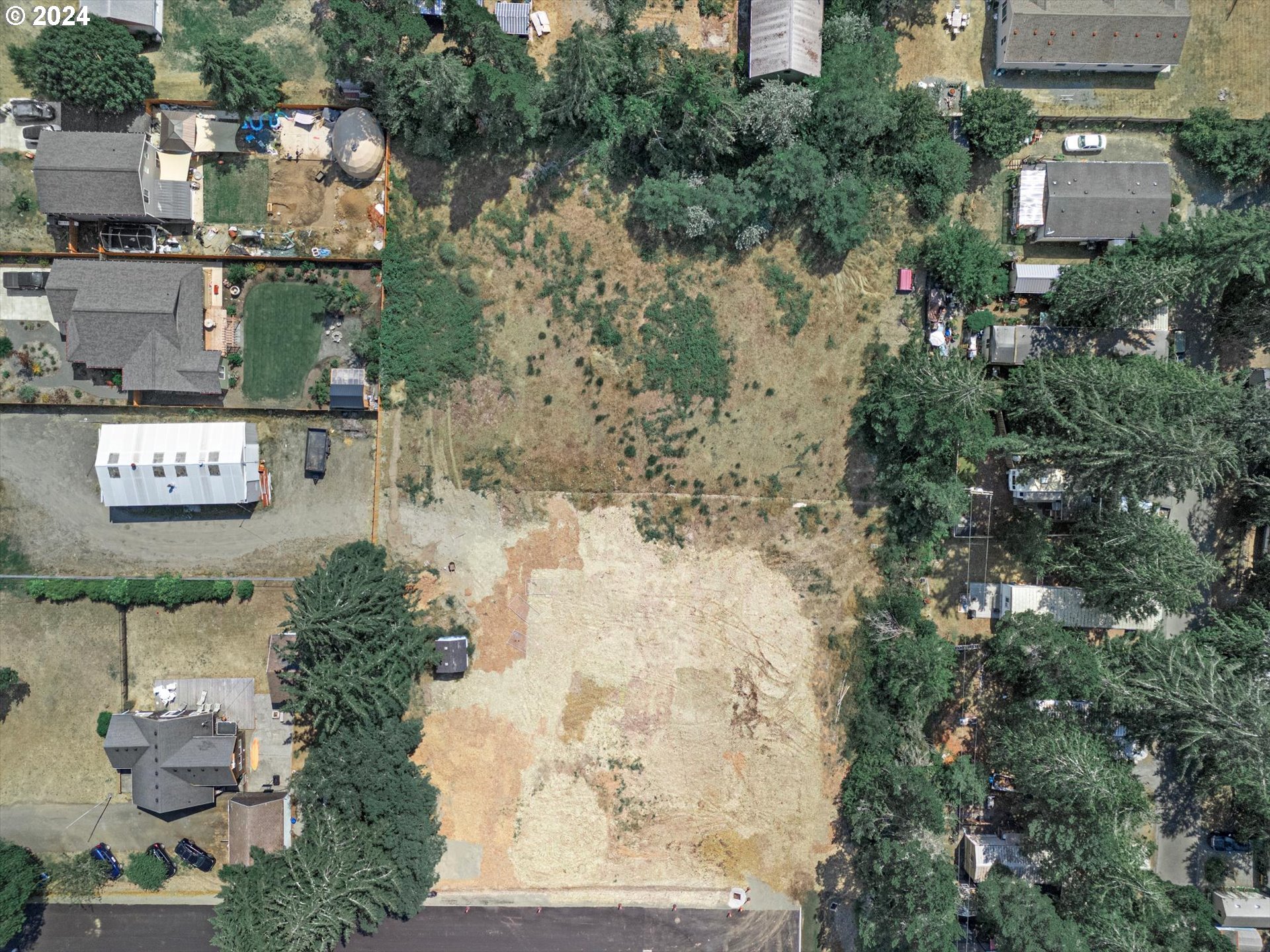 35340 Bayside Gardens Road Nehalem, OR 97131 - Photo 10 of 23 an aerial view of residential houses with outdoor space