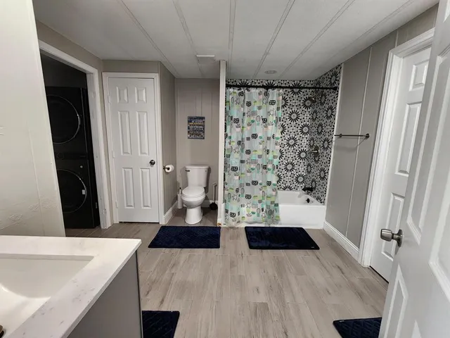 a bathroom with a sink and a shower