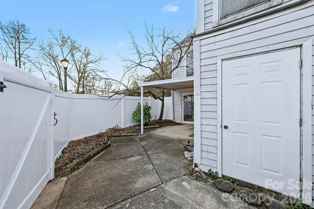 a view of a house with a snow in the yard