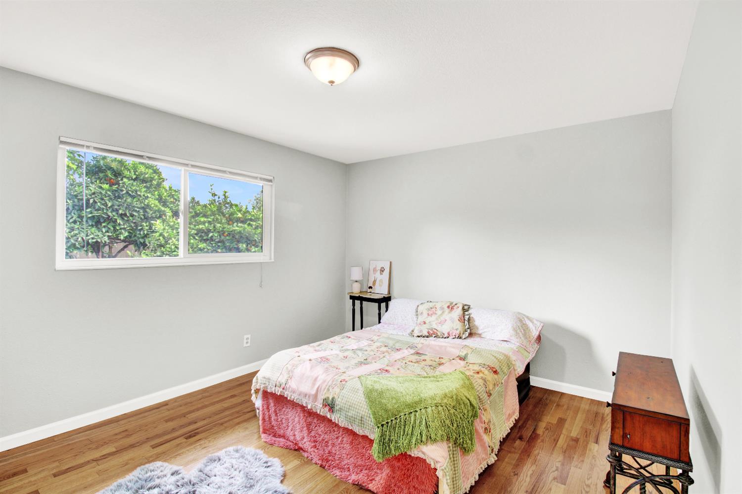 1530 Morene Way Modesto, CA 95355 - Photo 16 of 38 a bedroom with a bed and a window