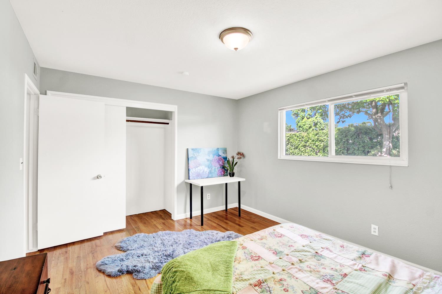 1530 Morene Way Modesto, CA 95355 - Photo 17 of 38 a bedroom with a bed and a window