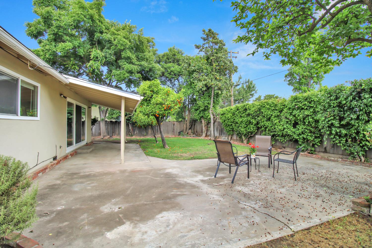 1530 Morene Way Modesto, CA 95355 - Photo 34 of 38 a view of a table and chairs in patio of the house