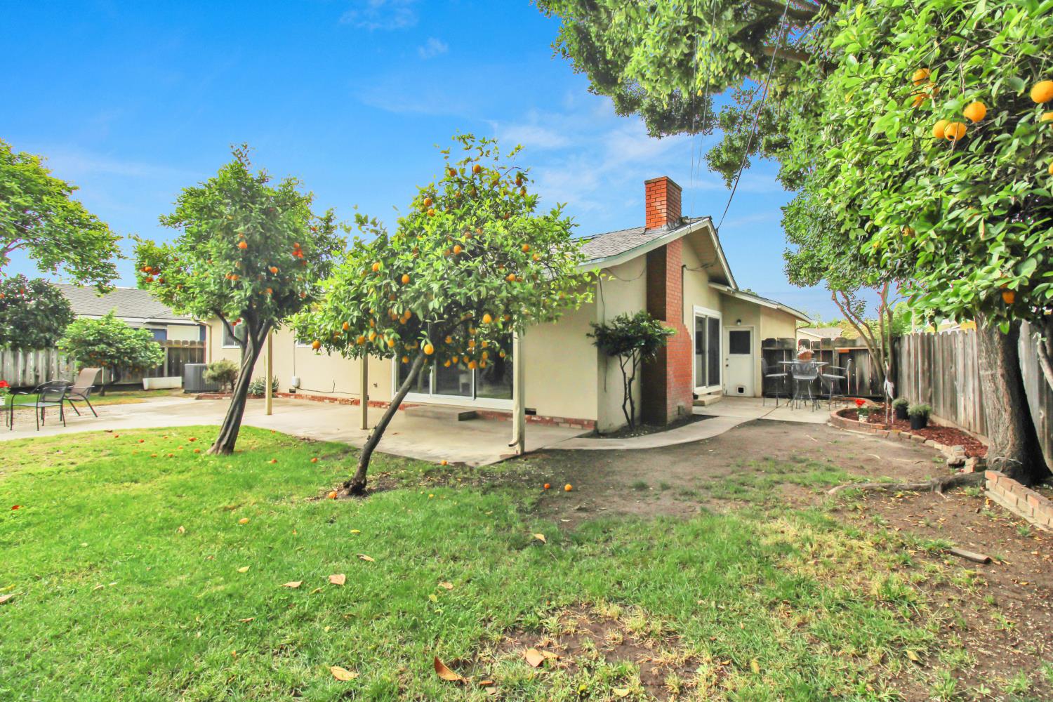 1530 Morene Way Modesto, CA 95355 - Photo 35 of 38 a backyard of a house with entertaining space
