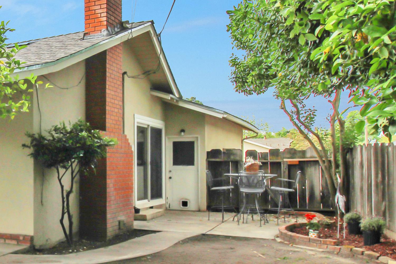 1530 Morene Way Modesto, CA 95355 - Photo 36 of 38 a front view of a house with outdoor seating