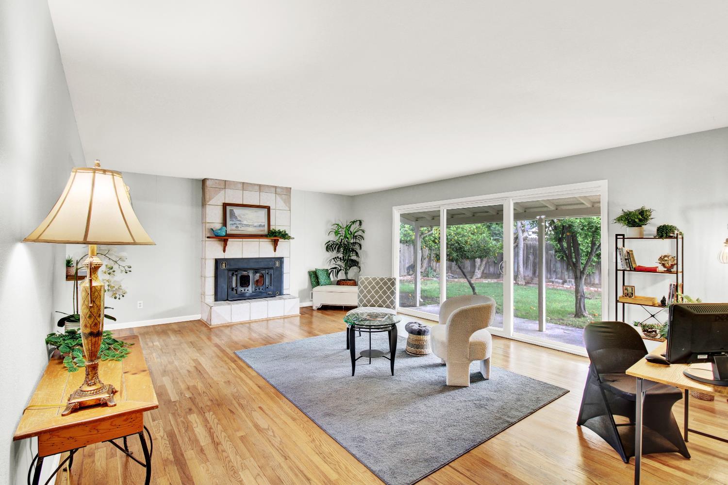 1530 Morene Way Modesto, CA 95355 - Photo 5 of 38 a living room with furniture and a lamp