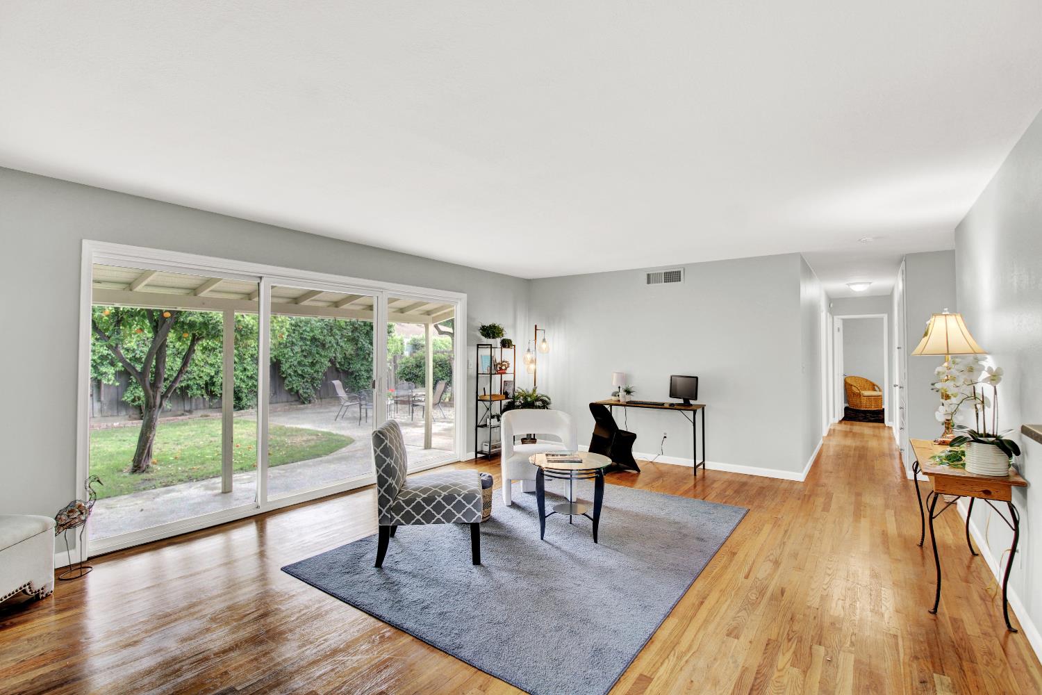 1530 Morene Way Modesto, CA 95355 - Photo 6 of 38 a living room with furniture and a wooden floor