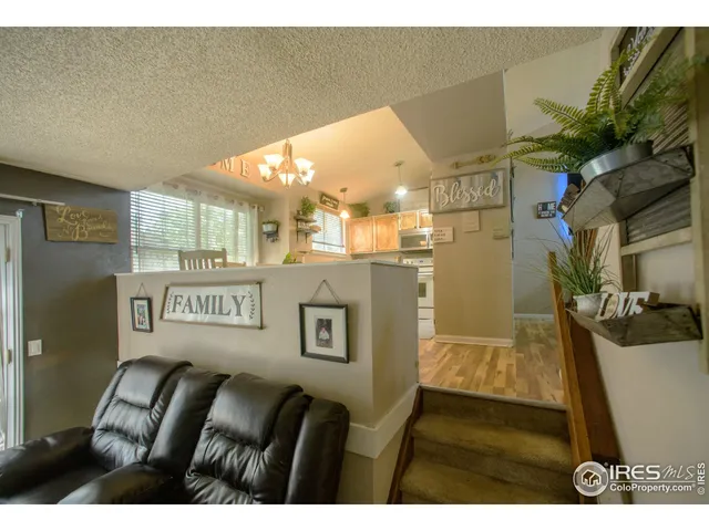 a view of a street with an outdoor seating