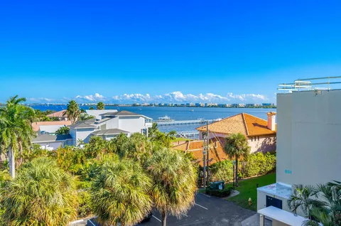 a balcony with lake view and a ocean view
